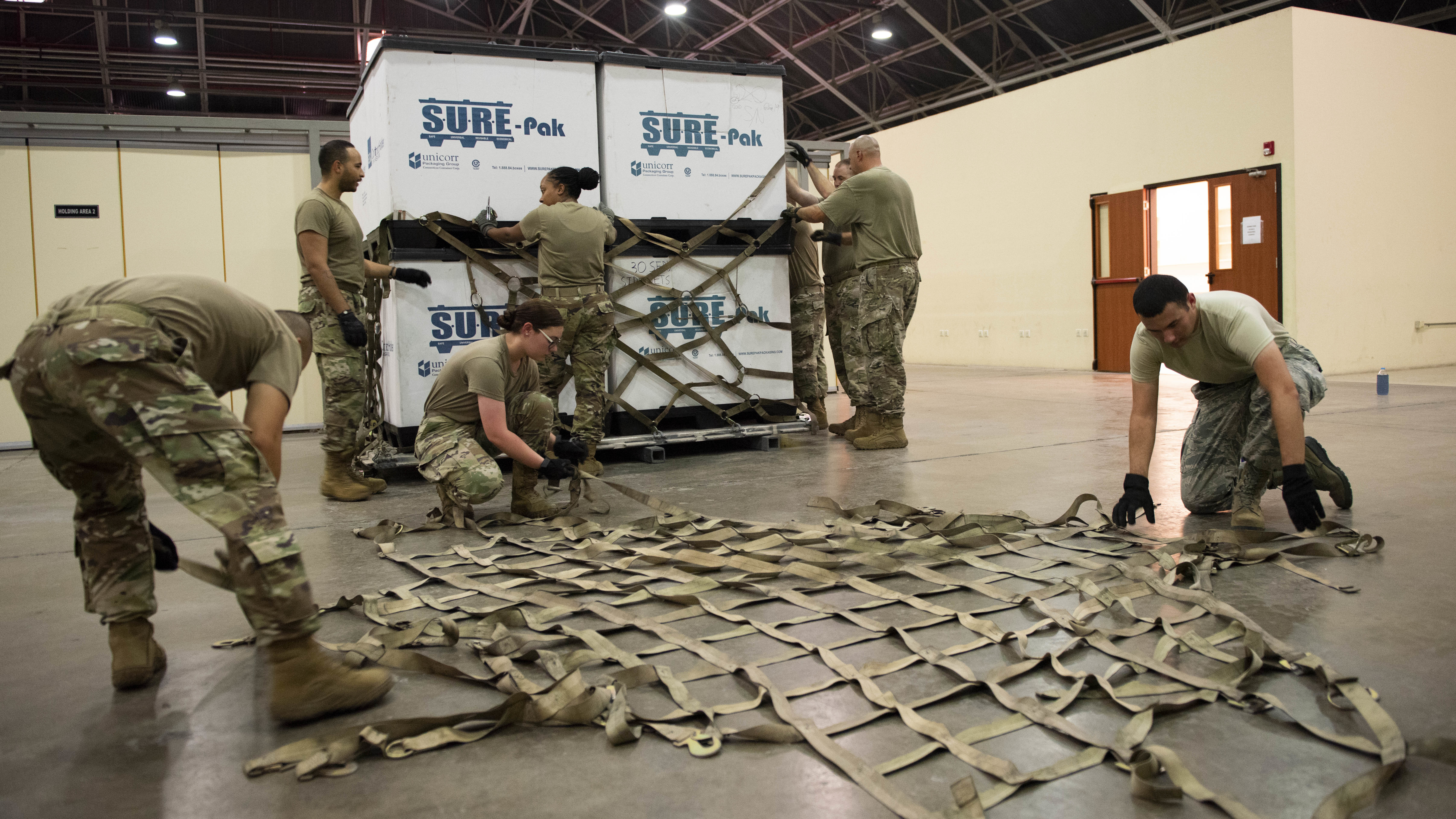 Image of Defense Health Agency Medical Logistics Team Maintains Supply Chain Ensuring Quality Health Care Delivery.