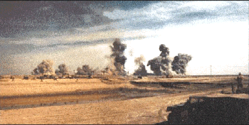 Figure 24. Continuing demolition on March 4 at Khamisiyah (from 207th Engineer Battalion observation point, looking southeast)