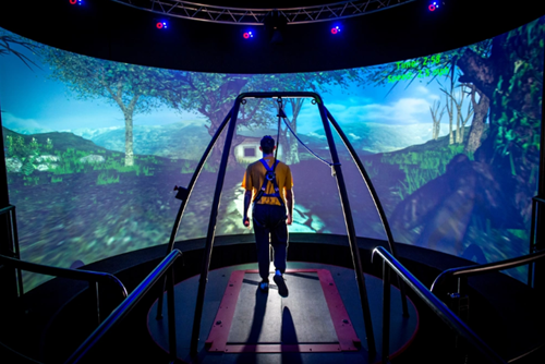 A Traumatic Brain Injury (TBI) patient walks through a virtual reality scenario at the Computer Assisted Rehabilitation Environment (CAREN) Laboratory at National Intrepid Center of Excellence (NICoE) at Walter Reed National Military Medical Center in Bethesda, Md., March 20, 2017.