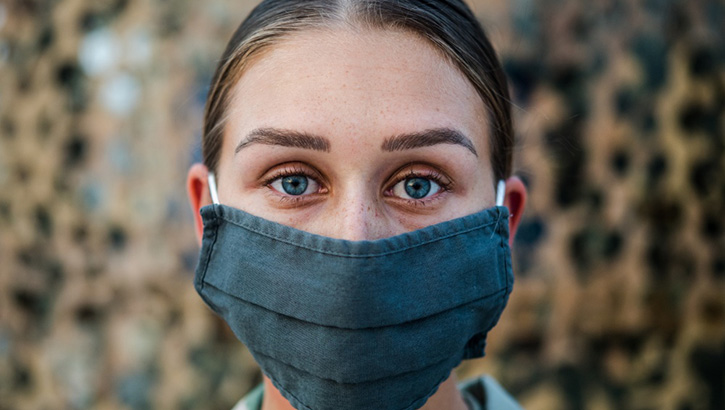 Image of Woman wearing a mask.