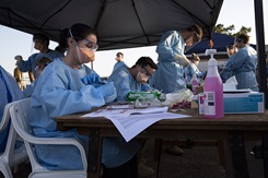 U.S. Marines with Marine Rotational Force - Darwin receive a second COVID-19 test during quarantine on Royal Australian Air Force Base Darwin in Darwin, NT, Australia, June 12, 2020. The COVID-19 test was administered to each Marine after arriving from California. All Marines will be quarantined for 14 days and undergo an additional test before quarantine release. No Marines tested positive for COVID-19. The U.S. Marine Corps and Australian Defence Force service members are working together to ensure the safety of the local community. (U.S. Marine Corps photo by Lance Cpl. Natalie Greenwood)