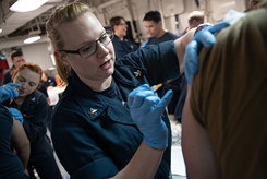 Adminstration of a seasonal flu vaccination. (U.S. Navy photo)