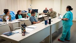 Victoria Morgan teaching the team about the common causes of cardiac arrest