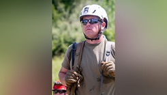 Air Force Staff Sgt. Bram Sanders, a medic with the 181st Medical Group Search and Extraction element assigned to the 19th Chemical, Biological, Radiological, Nuclear, and high-yield Explosives Enhanced Response Force Package, Indiana National Guard participates in training at a simulated disaster site during a pre-external evaluation sustainment year collective training event