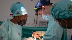 military medical personnel performing surgery