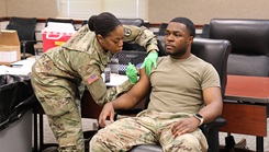 Leaders and soldiers receive their influenza vaccination as the annual flu shot campaign kicks off at the U.S. Army Aviation Center of Excellence headquarters at Fort Novosel, Alaska, on Oct. 18, 2023. (Photo by Kelly Morris/U.S. Army) 