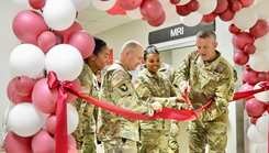 Military personnel at ribbon cutting ceremony