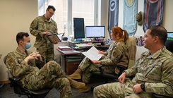 Liberty Wing Airmen from the Alcohol and Drug Abuse Prevention and Treatment program, or ADAPT, discuss up to date information regarding patients, training and case staffing at Royal Air Force Lakenheath