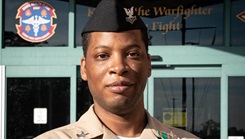 Military personnel posing for a picture