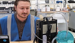 George Takacs, biomedical equipment technician works on battlefield medical equipment