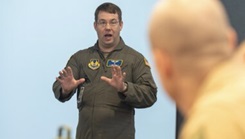 Lt. Col. Ryan Gough, 66th Medical Squadron chief of Aerospace Medicine, briefs joint attendees during an all-service recruiting summit at Hanscom Air Force Base, Mass., Sept. 29. The summit was the second meeting of leaders from across New England and New York to address the needs of recruiters in the region. (U.S. Air Force photo by Mark Herlihy)