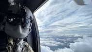 A resident featured in a UH-60 Blackhawk maintaining monthly flight hours. 