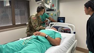 Cytopathology trainee practices ultrasound of a thyroid with guidance from Cytopathology faculty during Ultrasound-Guided Fine-Needle Aspiration Workshop in the Simulation Laboratory. 