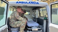 Fellow and faculty in an Honduran military ambulance.  