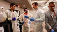 A Gastroenterology Faculty member teaches fellows how to do an endoscopy procedure.