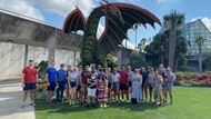 Residents pose at the SA Botanical gardens during a Fifth Friday social event.