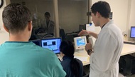 Staff physicians teaching principles of Nuclear Medicine hybrid imaging at a state-of-the-art SPECT/CT camera. 