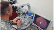 A resident training on the ophthalmic surgery simulator.