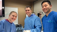 An Orthopedics PGY5 mentors two  Junior residents during a Foot and Ankle lab. 