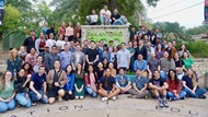 UT Health Psychiatry Residents posing in front of the San Antonio Zoo sign.