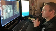 A resident reviews an MRI of the hips. 