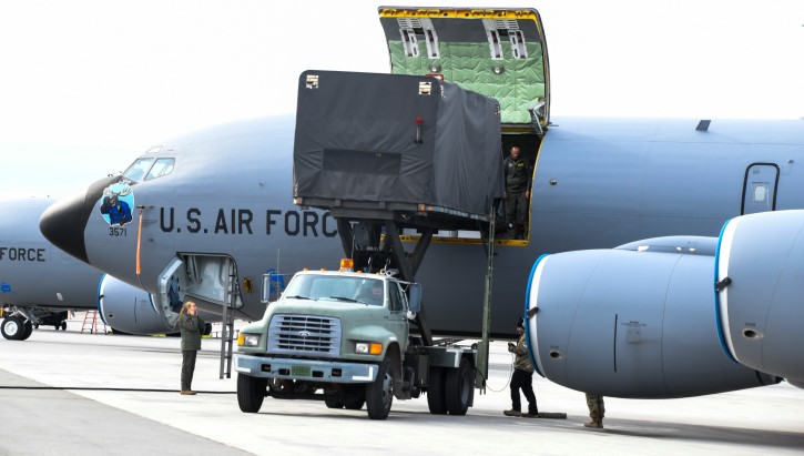 168th Wing boom operators and crew chiefs load a portable hyperbaric chamber on board a 168 WG KC-135 Stratotanker in collaboration with the 354th medical group, May 3, 2024, at Eielson Air Force Base, Alaska. Airmen of the 168 WG and 354th Fighter Wing conducted a training course on the Emergency Evacuation Chamber (EEHS) portable decompression sickness chamber, Hyperlite 1. The 354 FW flight medicine technicians and 168 WG boom operators simulated an emergency transport of a patient requiring oxygen therapy utilizing the portable hyperbaric stretcher. Lt. Col. Pablo Medina, the 959th Medical Director of the Undersea and Hyperbaric Medicine Program, led the course, encompassing in-depth didactics and practical hands-on training. Participants gained comprehensive knowledge of the EEHS system, including the set-up, transport, and loading procedures.