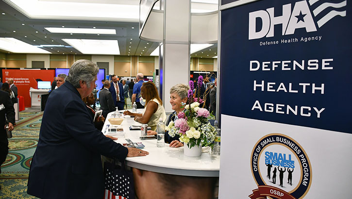 Image of People in an exhibit hall.