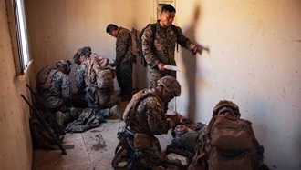 Link to Photo: Military personnel in medical training