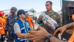 U.S. service members with Joint Task Force-Bravo load supplies aboard a U.S. Army CH-47 Chinook with 1st Battalion, 228th Aviation Regiment, JTF-B, in support of foreign assistance following Hurricane Melissa