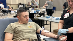 Soldier donating blood at a blood drive