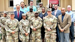 Leaders from Bayne-Jones Army Community Hospital and the Alexandria VA Health Care System gather for a group photo