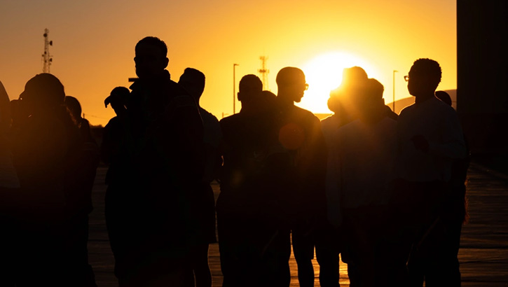 Image of Members of Team Minot wait at the starting line of a base-wide two-mile flight line run at Minot Air Force Base, North Dakota, on Sept. 27, 2024, as part of mental health training day. Changes made by the Defense Counterintelligence and Security Agency to national security clearance application forms, and its presentations destigmatizing mental health care should reassure service members they can be more open about their mental health care. It’s rare to be denied a security clearance or keeping a current clearance. (U.S. Air Force photo by Senior Airman Alexander Nottingham) .