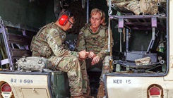 Military personnel during a hearing test