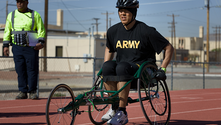 Image of U.S. Army Sgt. 1st Class David Hong prepares for the 100-meter wheelchair race during the track competition at the 2025 Army Trials.