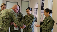 Military medical personnel participate in the Blessing of the Hands