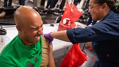 U.S. Navy Chief Aviation Boatswain’s Mate Louis Mountain receives his flu shot from U.S. Navy Hospital Corpsman 3rd Class Stevie Shavers, from Ravenswood, W.Va., aboard the Nimitz-class aircraft carrier USS Theodore Roosevelt, on Oct. 27, 2023. A ship’s medical department is vital to keeping the entire crew healthy and safe during deployments. (Photo by U.S. Navy Mass Communication Specialist 3rd Class Jahred Johnson) 