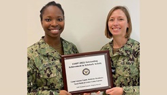 Military personnel posing for a picture