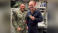 Medical personnel pose with award