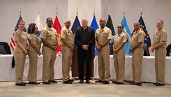 Military personnel posing for a picture