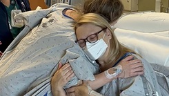 Two patients hugging after kidney donor surgery