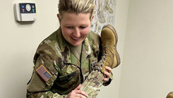 Capt. Shelby Landrum works on a patient