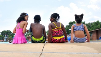 Link to Photo: Children sitting by the pool