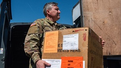 U.S. Army Sgt. 1st Class Levon Locken, Landstuhl Regional Medical Center medical lab technician, carries a box of replicated blood products as part of Defender Europe 25 Exercise