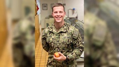 Military personnel posing for a picture