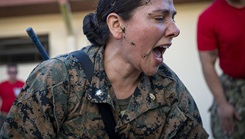 U.S. Navy Commander Flavia Soto, a participant of Operation Blue Horizon, performs tactical combat care on a manikin