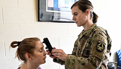 U.S. Army Maj. Dana Bal tests a brain hemorrhage detection device during familiarization training at the headquarters of the U.S. Army Medical Materiel Development Activity, Fort Detrick, Md., Dec. 28, 2022. Bal serves as part of the Program Management-Acquisition Internship Program and as assistant product manager with USAMMDA’s Warfighter Brain Health Project Management Office. (U.S. Army Photo by T. T. Parish)  