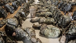 Military personnel on a plane