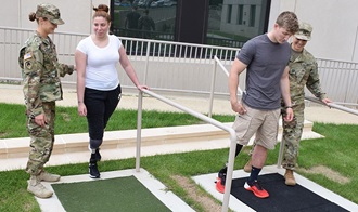 Link to Photo: The new terrain park outside of the Military Advanced Training Center at Walter Reed National Military Medical Center provides another means for Walter Reed Bethesda physical therapists to simulate uneven terrain for their amputee patients without having to go to specific destinations to do so. (DoD photo by Mark Oswell)