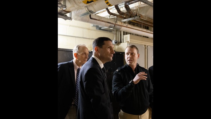 Recently appointed Department of Defense leadership visited the hospital on Feb. 1, 2025, to survey the damage. Darin Selnick (front center), the official performing the duties of Under Secretary of Defense for Personnel and Readiness, listens to U.S. Navy Cmdr. Russel Jarvis (right), Walter Reed’s chief of facilities, explain the extent of the water damage in a mechanical room. On the left is Acting Principal Deputy Assistant Secretary of Defense for Health Affairs Dr. David Smith.