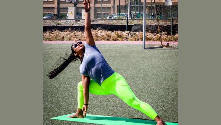 Image of Military personnel doing a yoga pose.